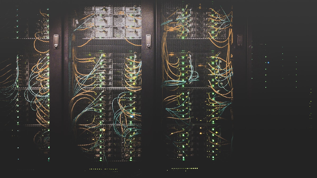 Abstract network of connected nodes representing AI agents communicating through machine-readable interfaces